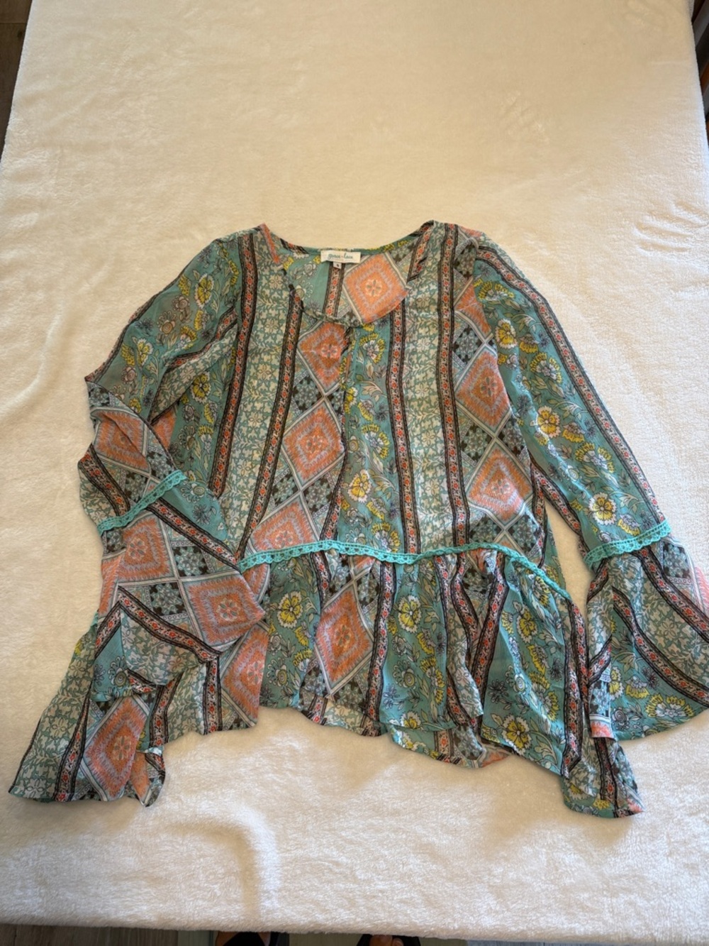 Grace & Lace Boho Patchwork Blouse with bell sleeves and teal accents